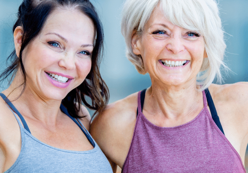 midlife metabolism two women over 45 celebrating fitness